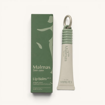 Malmas Skin Care Vanilla & Caramel Lip Balm SPF15 with a green ribbed cap and silver ring, 10ml tube.
